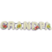 A long, name-shaped floral arrangement spells "GRANDPA" in bold capitals, elegantly showcased against a clean white background, reminiscent of a tribute waiting to be placed at a quiet service in Shooter's Hill. Each letter is deeply padded with small, immaculate white chrysanthemums, the petals overlapping to form a soft, cushiony surface that suggests comfort and peace. The base of every letter is encircled by a delicate band of pale lavender ribbon, its cool pastel tone lending gentle definition and a hint of refinement without disturbing the calm, all-white field of flowers. The letters are subtly joined by dark green support bars that keep the word steady and continuous. Four artisan-styled sprays add colour and personality. On the "G" and "D" sit clusters of rich red anthuriums, their glossy, heart-shaped petals and upright yellow spadices rising from beds of deep green foliage and touches of small purple blooms, symbolising deep affection and heartfelt remembrance. The first "A" and the final "A" are softened by sprays of yellow-green orchids, their slender petals and intricate centres arranged among fresh green leaves, giving the tribute a modern yet timeless elegance that many families across Shooter's Hill appreciate. The flowers look newly cut and expertly placed, as though a local florist has just finished preparing them for same-day delivery to a church or crematorium on Shooters Hill Road. Overall, the tribute radiates quiet dignity, offering a personalised farewell for a beloved grandfather and a gentle focal point for mourners gathering to say goodbye.